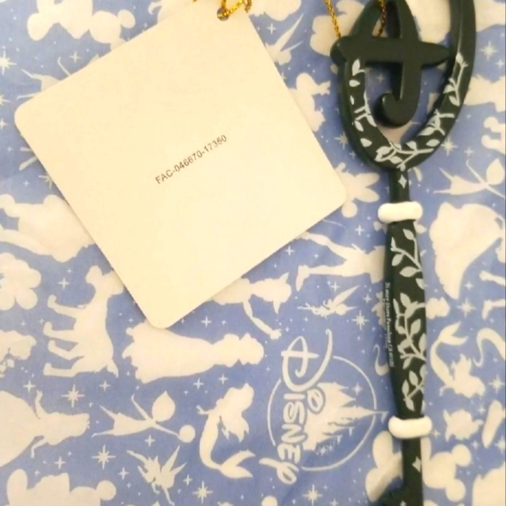 Disney Store Opening Ceremony Key With Tag.